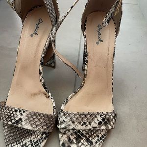 Heels animal print size 8.5 used them a couple of times good conditions